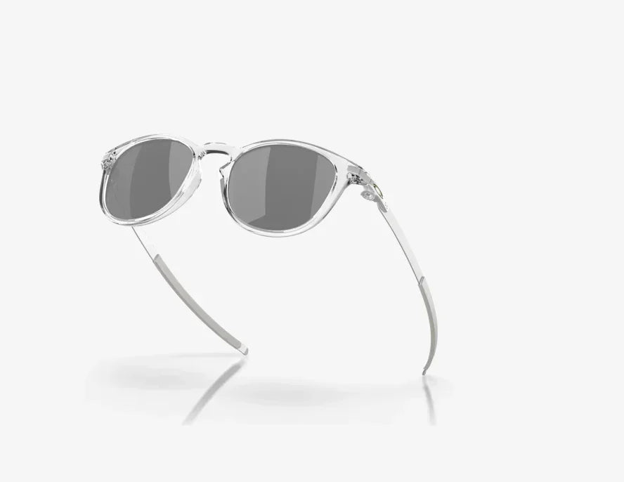 Oakley sunglasses with clear polished frame and black lenses, sports eyewear