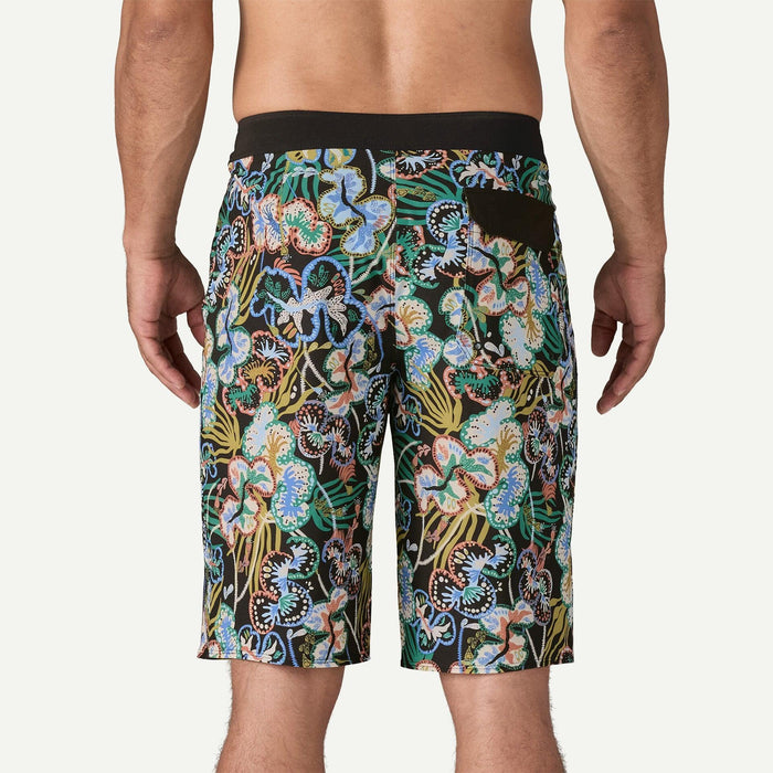 Patagonia men's Hydropeak boardshorts in undersea black with floral print, back view