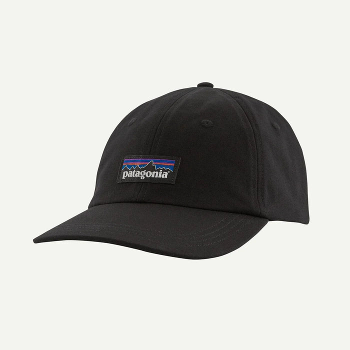 Patagonia black cap with P-6 label, surf clothing accessory for watersports.