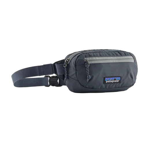 Patagonia Navy blue waist bag with Patagonia logo on a white background