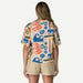 Patagonia short-sleeve surf shirt with colourful sardine and wave print, natural background