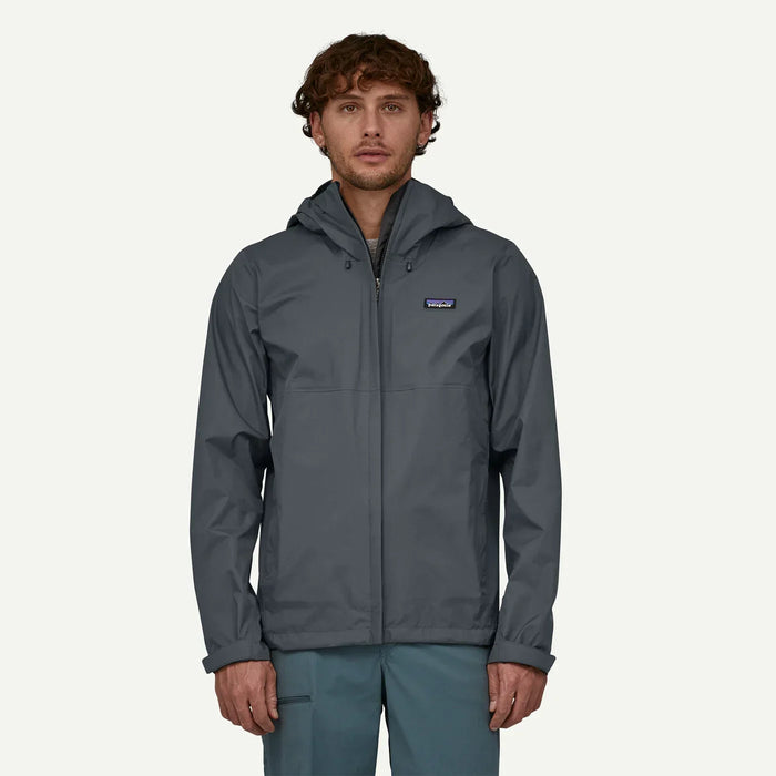 Patagonia Torrentshell 3L rain jacket in smolder blue with hood, front view