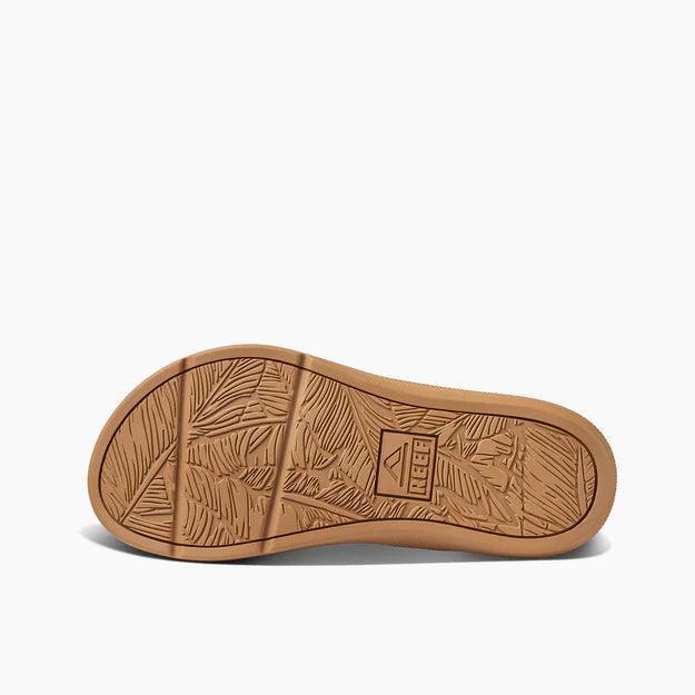 Reef Santa Ana flip flop with tan sole, leaf tread pattern, visible Reef logo
