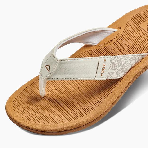 Reef Santa Ana flip flop with tan sole and white strap, summer surf footwear