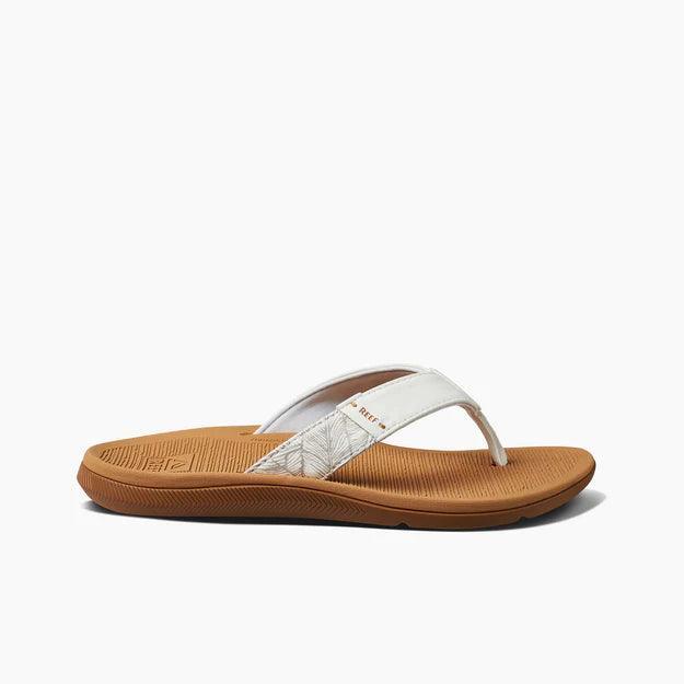 Reef Santa Ana flip flop sandal with white strap and brown sole, side view