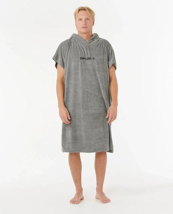 Rip Curl olive hooded towel poncho for watersports, worn by a model on white background