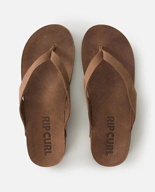 Rip Curl tan leather open toe sandals, flip flops with logo, viewed from above