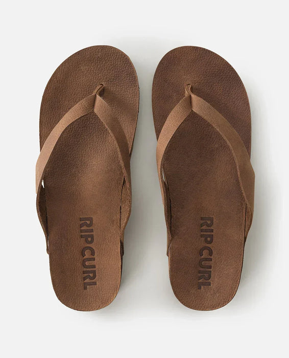 Rip Curl tan leather open toe sandals, flip flops with logo, viewed from above
