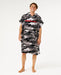 Rip Curl hooded towel poncho in black and grey camo, worn by a man, ideal for watersports
