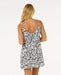 Rip Curl mini dress with navy and white floral print, adjustable straps, back view