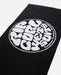 Rip Curl black beach towel with large white logo, ideal for surfing and watersports.