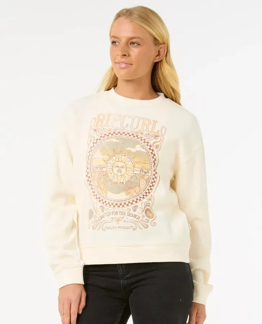Rip Curl Luna relaxed crew sweatshirt in bone with sun graphic, worn by woman