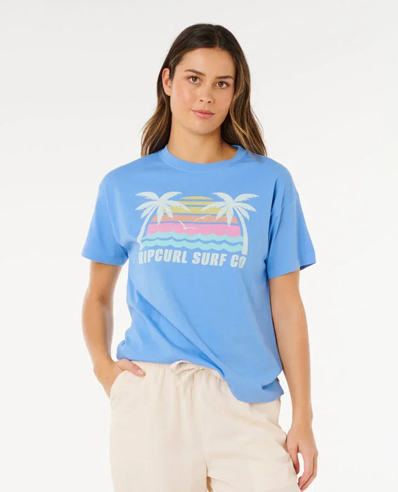 Rip Curl Malibu Relaxed Tee in cornflower blue with surf graphic and palm trees, surf clothing
