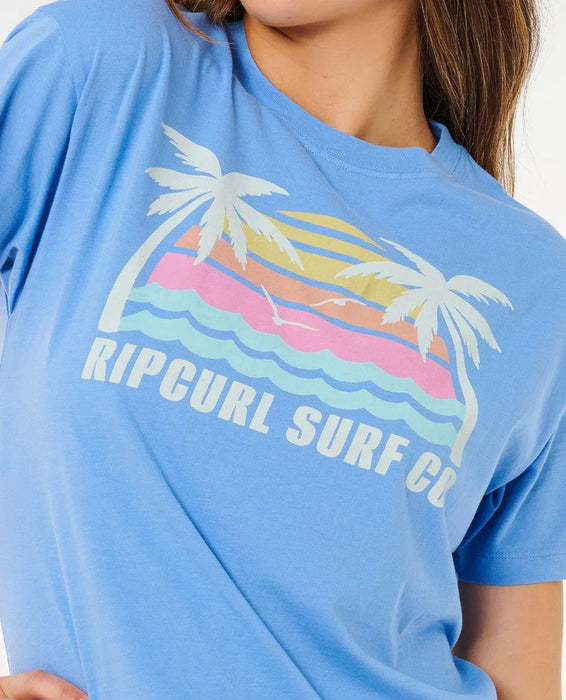 Rip Curl Malibu relaxed tee in cornflower blue with palm tree and sunset surf graphic