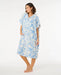Rip Curl hooded towel poncho in blue and cream floral pattern, ideal for watersports