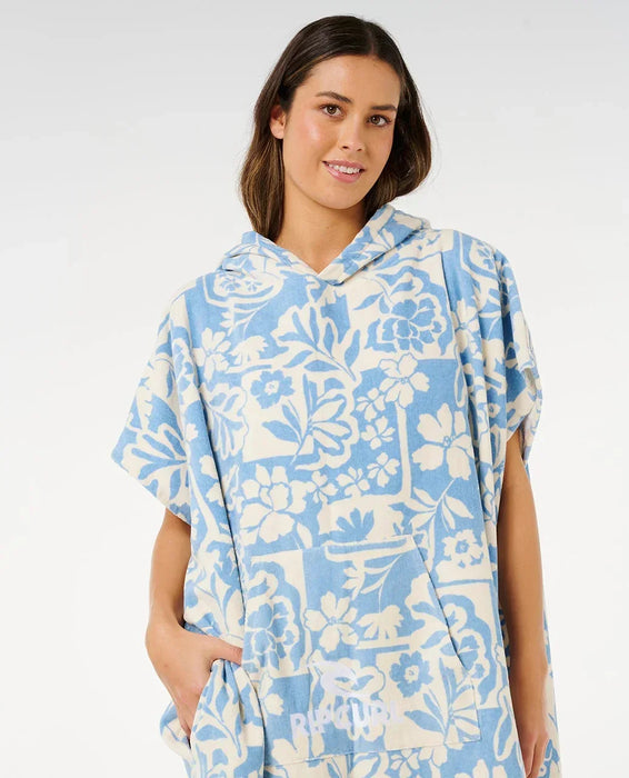 Rip Curl blue floral hooded towel poncho for watersports, front pouch pocket visible