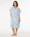 Rip Curl mixed hooded towel poncho in blissful blue with floral print, worn by a woman