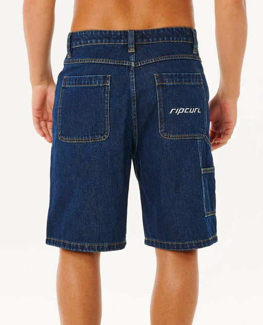 Rip Curl men's indigo denim walkshorts, back view, with logo and patch pockets