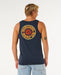 Rip Curl dark navy tank vest with large surf logo on back, worn by man in denim shorts