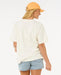 Rip Curl heritage tee in bone, short sleeve surf t-shirt, model wearing denim shorts
