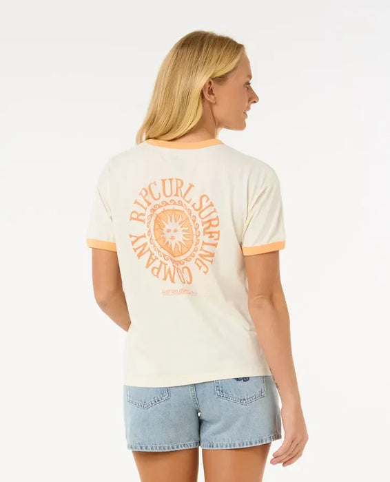 Woman wearing Rip Curl ringer tee in bone with orange trim and sun logo, surf clothing