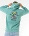 Rip Curl blue lagoon hoody with surf graphic, worn by person facing backwards
