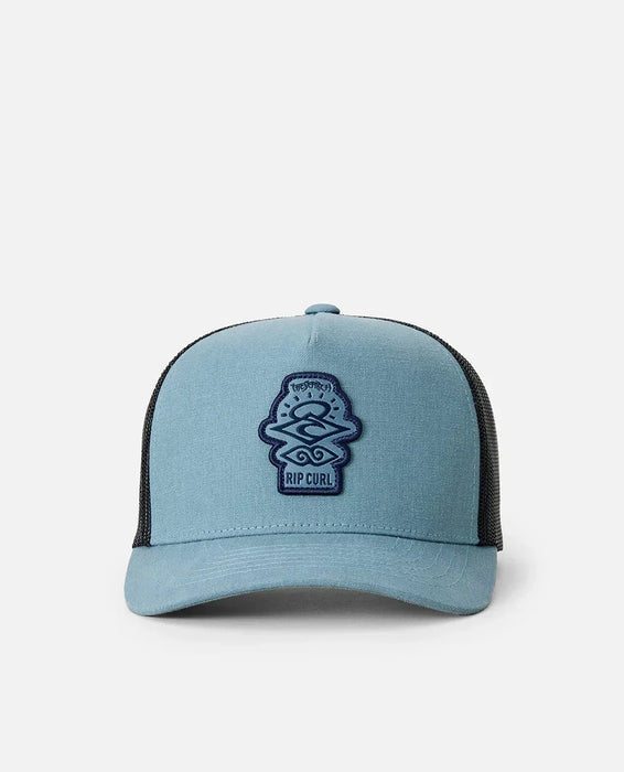 Rip Curl kids trucker cap in faded denim blue with mesh back and embroidered front logo.