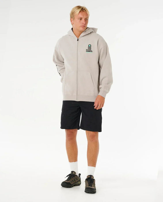 Rip Curl stone grey zip up hoody with chest logo, worn by man with black shorts