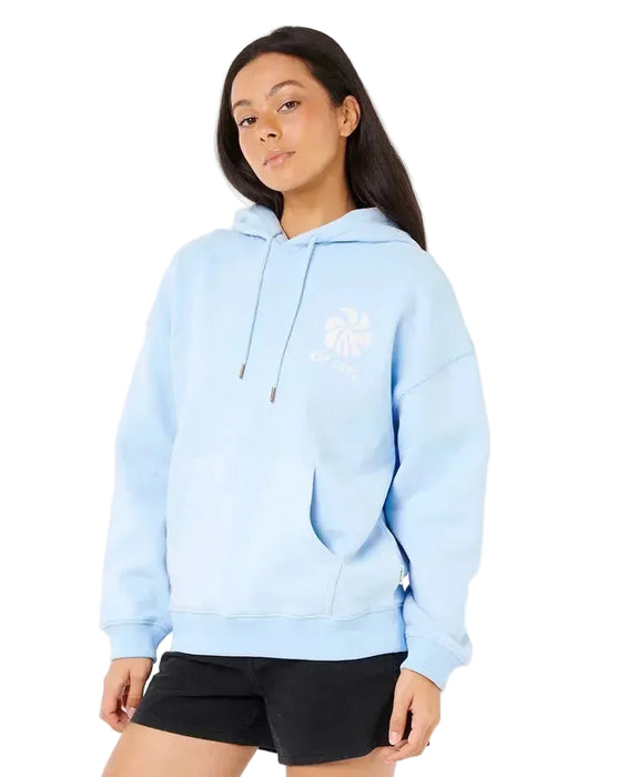 Rip Curl light blue heritage hooded sweatshirt with white logo, worn by woman