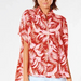 Rip Curl Sun Rays ladies shirt in red with pink tropical leaf print, short sleeves, button up