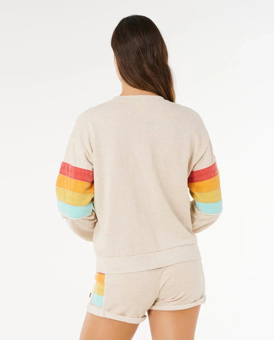 Rip Curl women's oatmeal surf crew sweatshirt with rainbow stripe sleeves, shown from back
