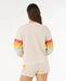 Rip Curl women's oatmeal surf crew sweatshirt with rainbow stripe sleeves, shown from back