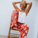 Rip Curl Ventura wide leg red floral print surf pants, relaxed summer beachwear