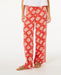 Rip Curl red wide leg beach pants with white floral pattern, relaxed fit, women's surf clothing
