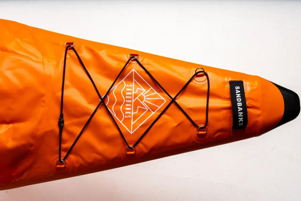 Sandbanks orange inflatable kayak nose with bungee cords and logo detail