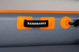 Sandbanks single seater inflatable kayak with grey body and orange trim, close-up handle