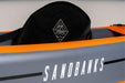 Sandbanks single seater inflatable kayak in grey and orange with branded black seat