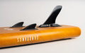 Sandbanks SUP paddleboard with wood-effect finish and three black fins