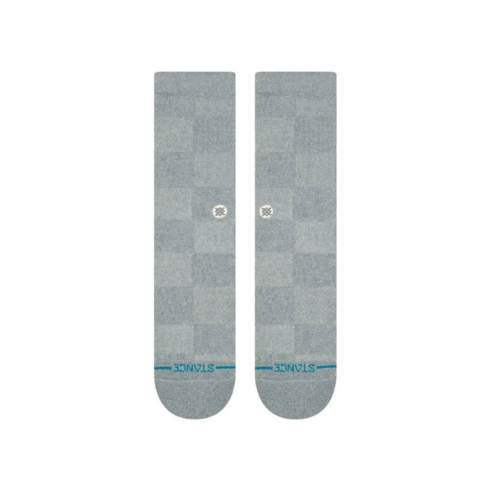 Stance blue crew socks with checkered pattern and logo, watersports surf clothing