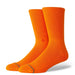 Stance orange crew socks with ribbed design and logo, surf and watersports clothing