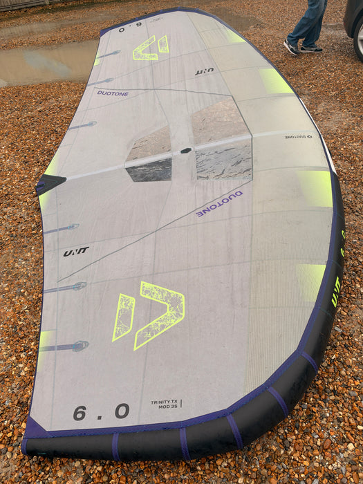 Used Duotone Unit 2027 6m wing laid out showing its canopy and 6.0 size marking