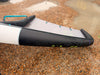 Side view of the used Duotone Unit 6m wing showing the leading edge and turquoise boom