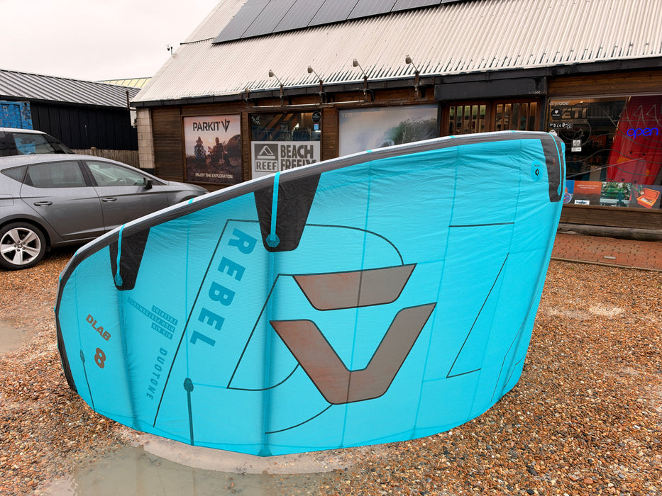 Duotone Rebel D/LAB 8m kite in turquoise and grey, full view outdoors
