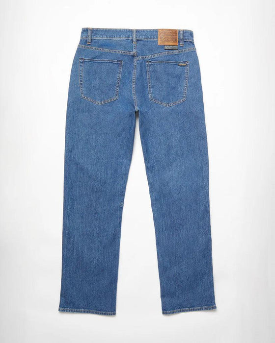 Volcom Modown jeans in bold blue denim, straight leg, rear view with patch and label visible