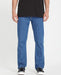 Volcom Solver jeans bold blue, straight fit, modeled with black top and trainers
