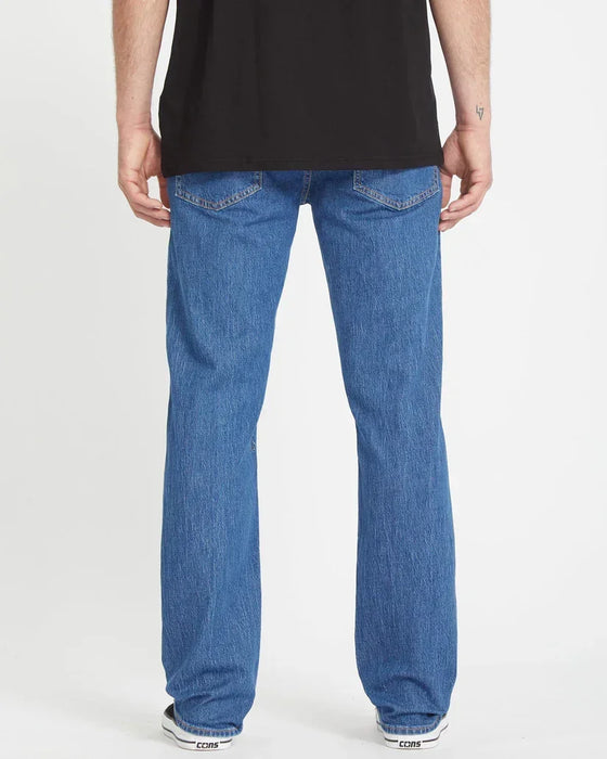 Volcom Solver Jeans in bold blue denim, shown from the back, casual surf clothing