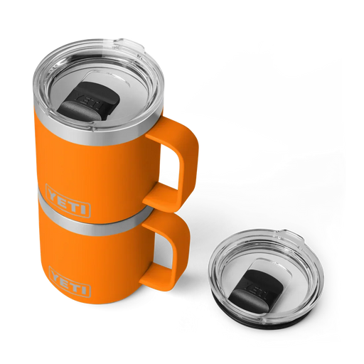 Orange YETI insulated travel mug with handle and clear lid, ideal for watersports adventures.