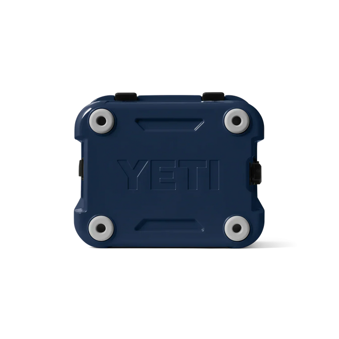 YETI Roadie 24 hard cooler in navy blue, durable insulated design for watersports